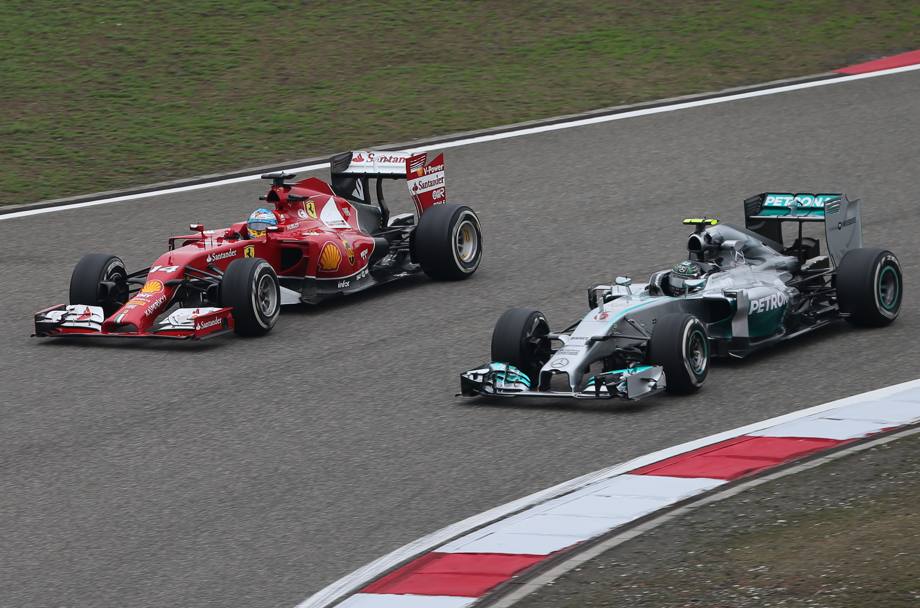 Rosberg e Alonso. Ap
